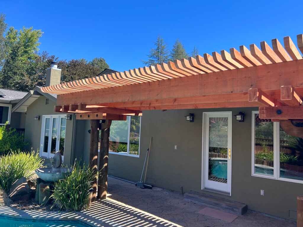 Restoring Faded Wooden Pergola With Protective Stain