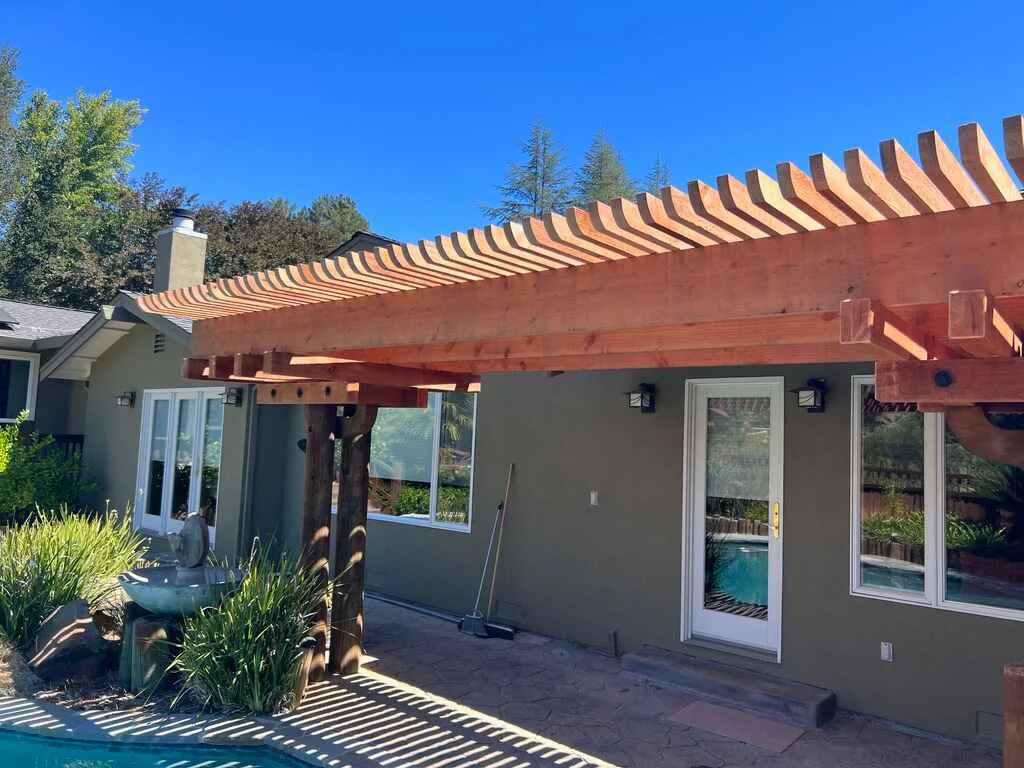 Restoring Faded Wooden Pergola With Protective Stain