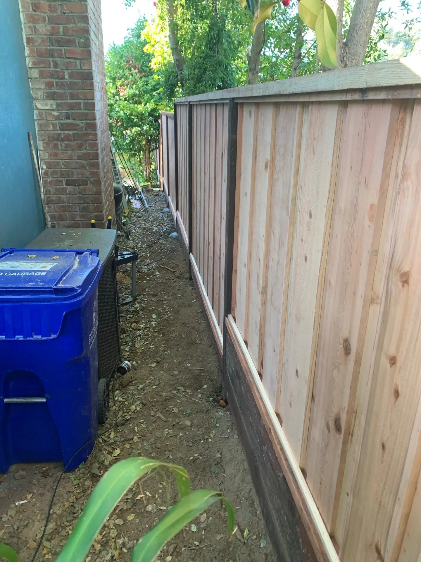 Horizontal Wood Privacy Fence Installed in Suburban Backyard